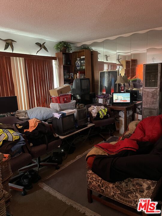 4431 Don Ricardo Drive, Unit 10 Los Angeles, CA 90008 - Photo 9 of 11 a room with furniture