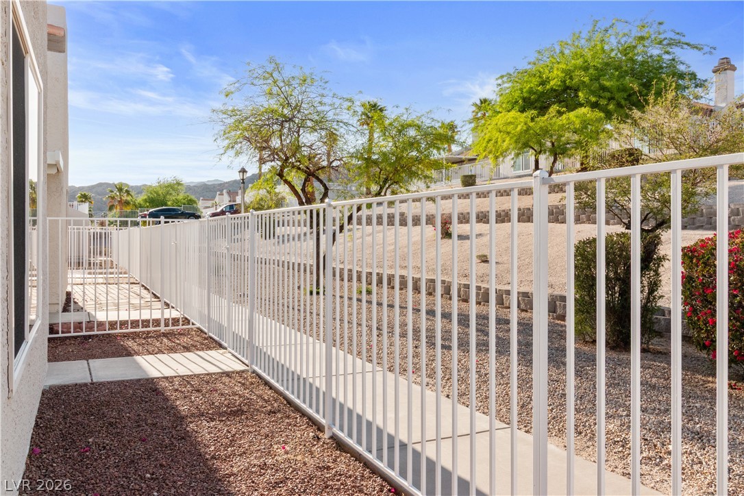2146 High Dunes Lane Laughlin, NV 89029 - Photo 46 of 64 View of gate featuring fence
