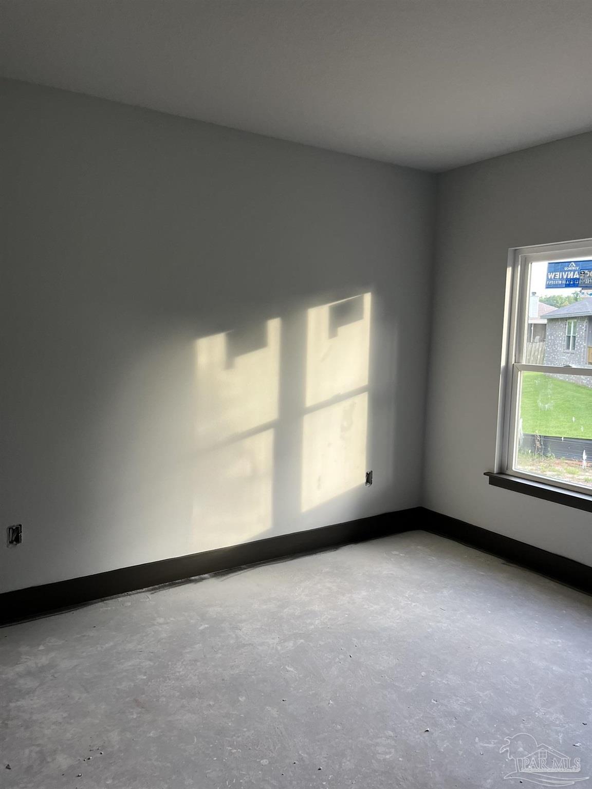 4991 Timber Ridge Drive Milton, FL 32571 - Photo 18 of 25 an empty room with a window