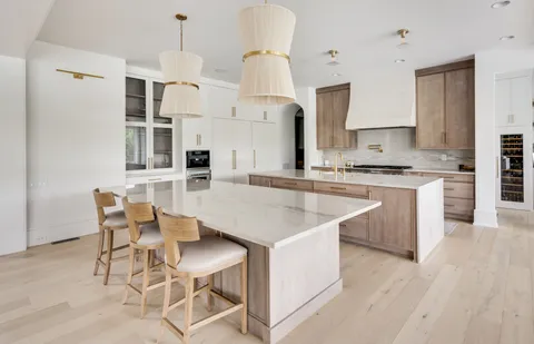 a view of living room with granite countertop furniture and fireplace