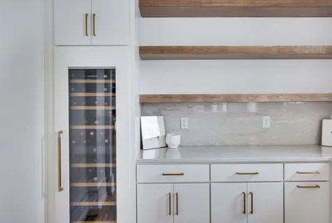 a view of a dining room with furniture wooden floor and chandelier