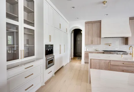 a dining room with furniture and a window
