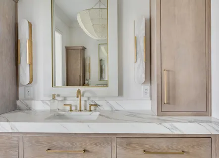 a living room with furniture a sink and a window