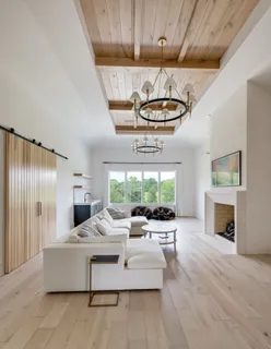 a spacious bathroom with a double vanity sink and a mirror