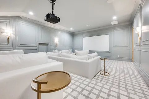 a bedroom with a bed a window and walk in closet