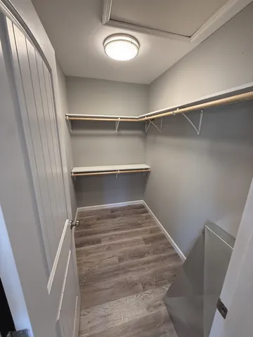 a view of a room with racks on the wall