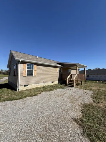 a house view with a backyard space