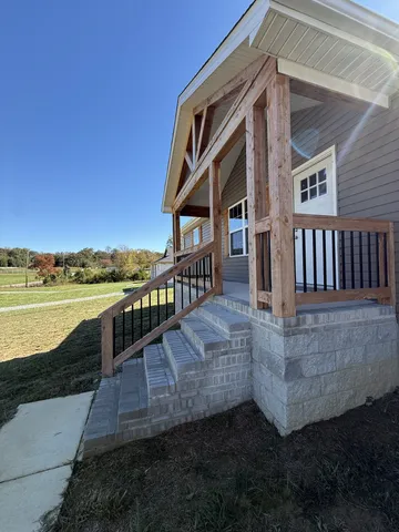 a view of a balcony with an ocean view
