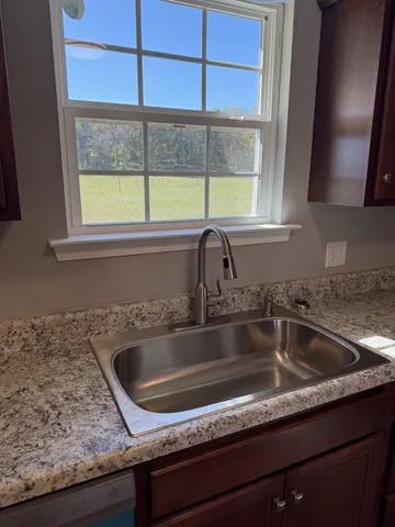 a close view of sink and a window