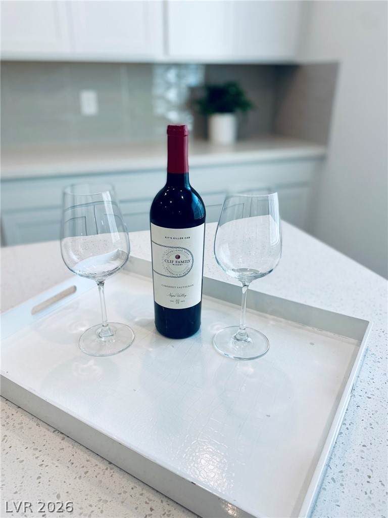4457 Sawyer Ridge Street Las Vegas, NV 89147 - Photo 12 of 32 This sleek kitchen island provides the perfect setting for casual entertaining.