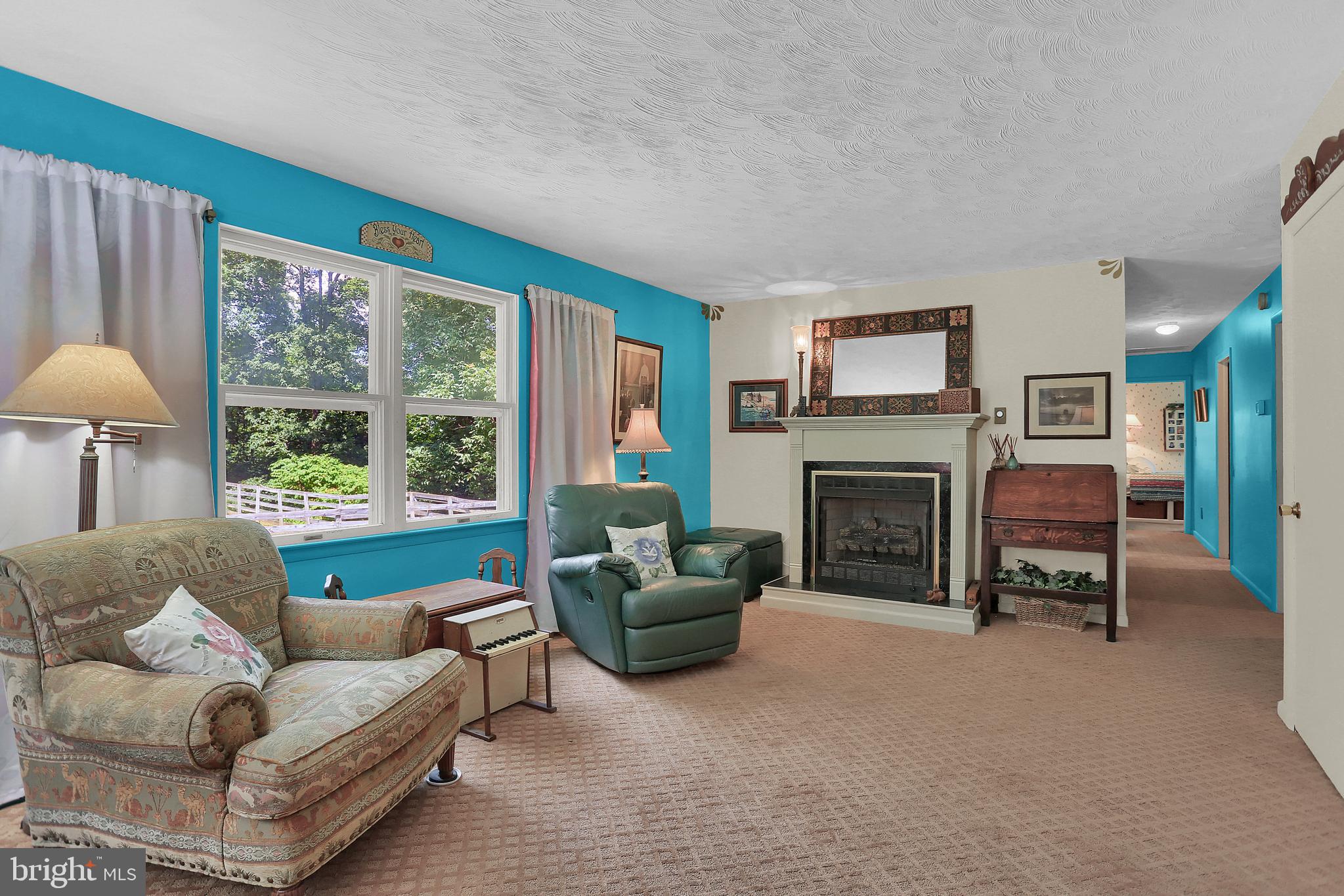 7939 Hickory Road Stewartstown, PA 17363 - Photo 17 of 49 Main level living room with view of pool