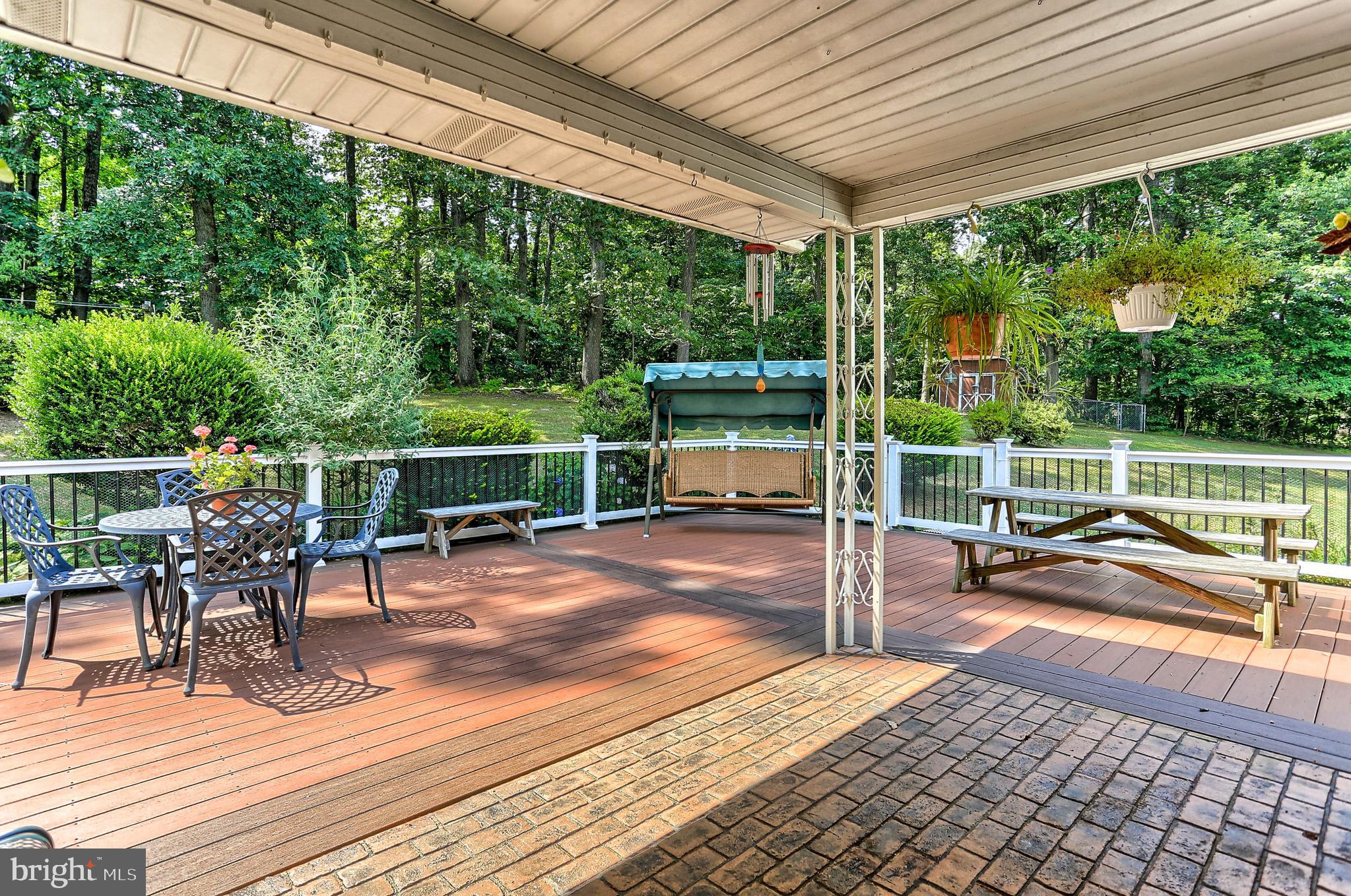7939 Hickory Road Stewartstown, PA 17363 - Photo 32 of 49 TREX decking with concrete stamped accent