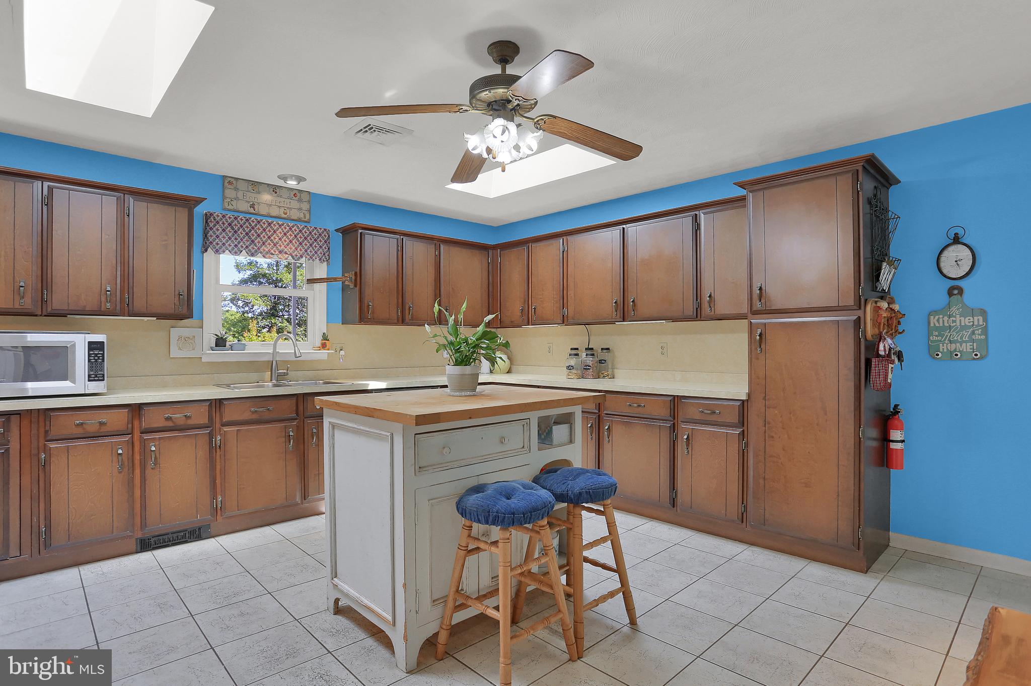 7939 Hickory Road Stewartstown, PA 17363 - Photo 7 of 49 Spacious Kitchen with wood cabinetry