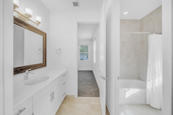 23008 Clear Echo Drive, Unit 11 Boca Raton, FL 33433 - Photo 53 of 80 25 Jack and JIll Bathroom (1)