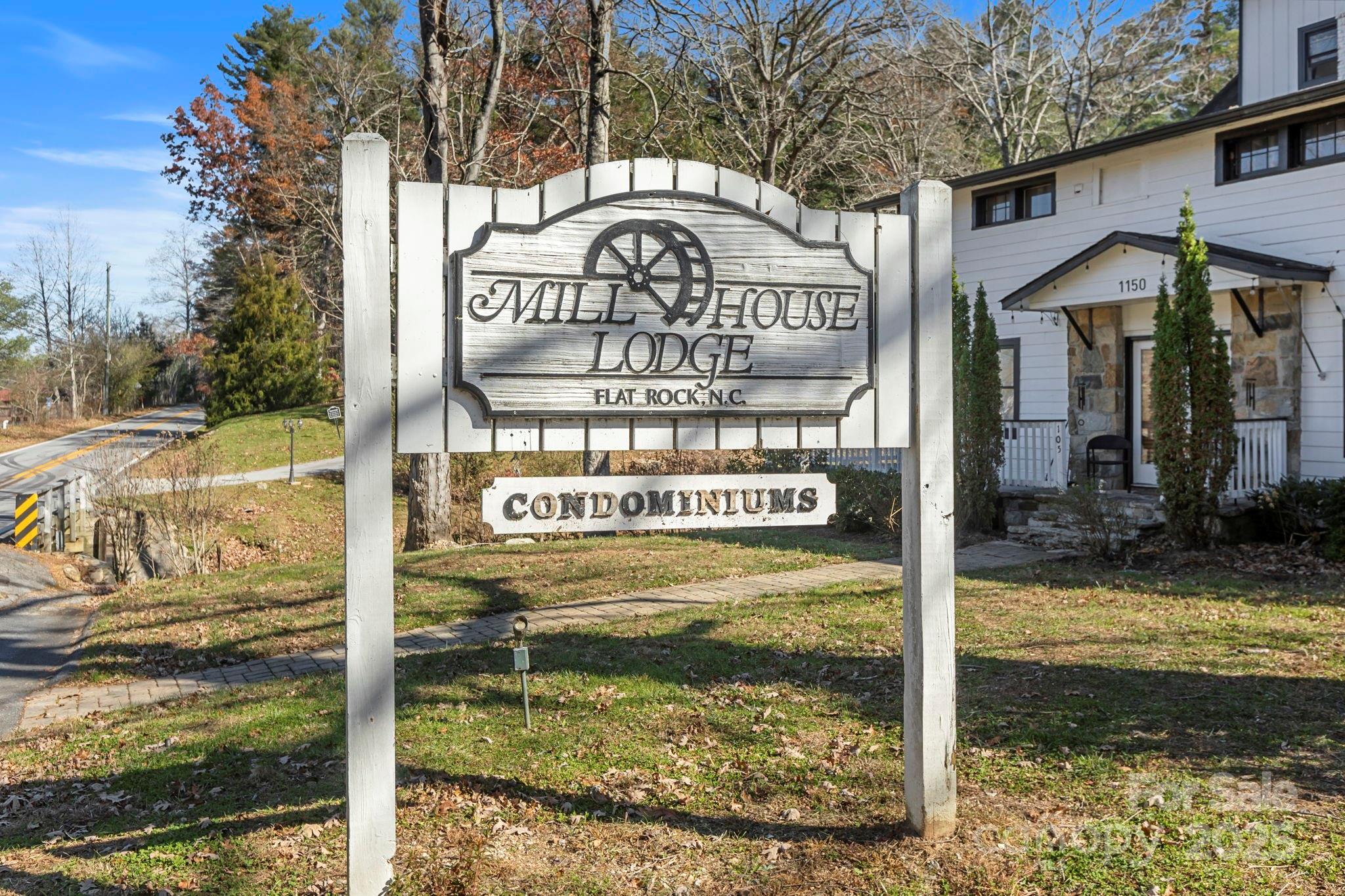 130 Old Mill Road, Unit 202 Flat Rock, NC 28731 - Photo 17 of 25 a view of water fountain with wooden fence
