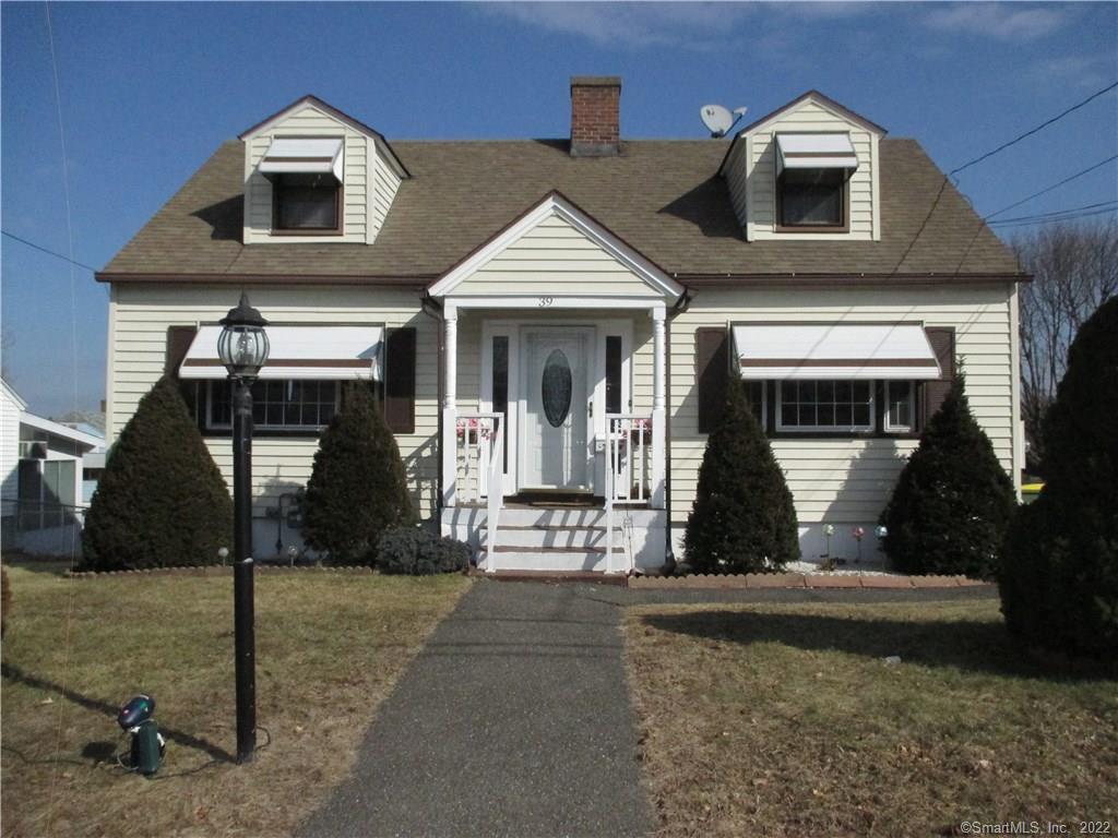 39 Blake Street Waterbury, CT 06708 - Photo 1 of 1 a view of a house with a door and a fireplace