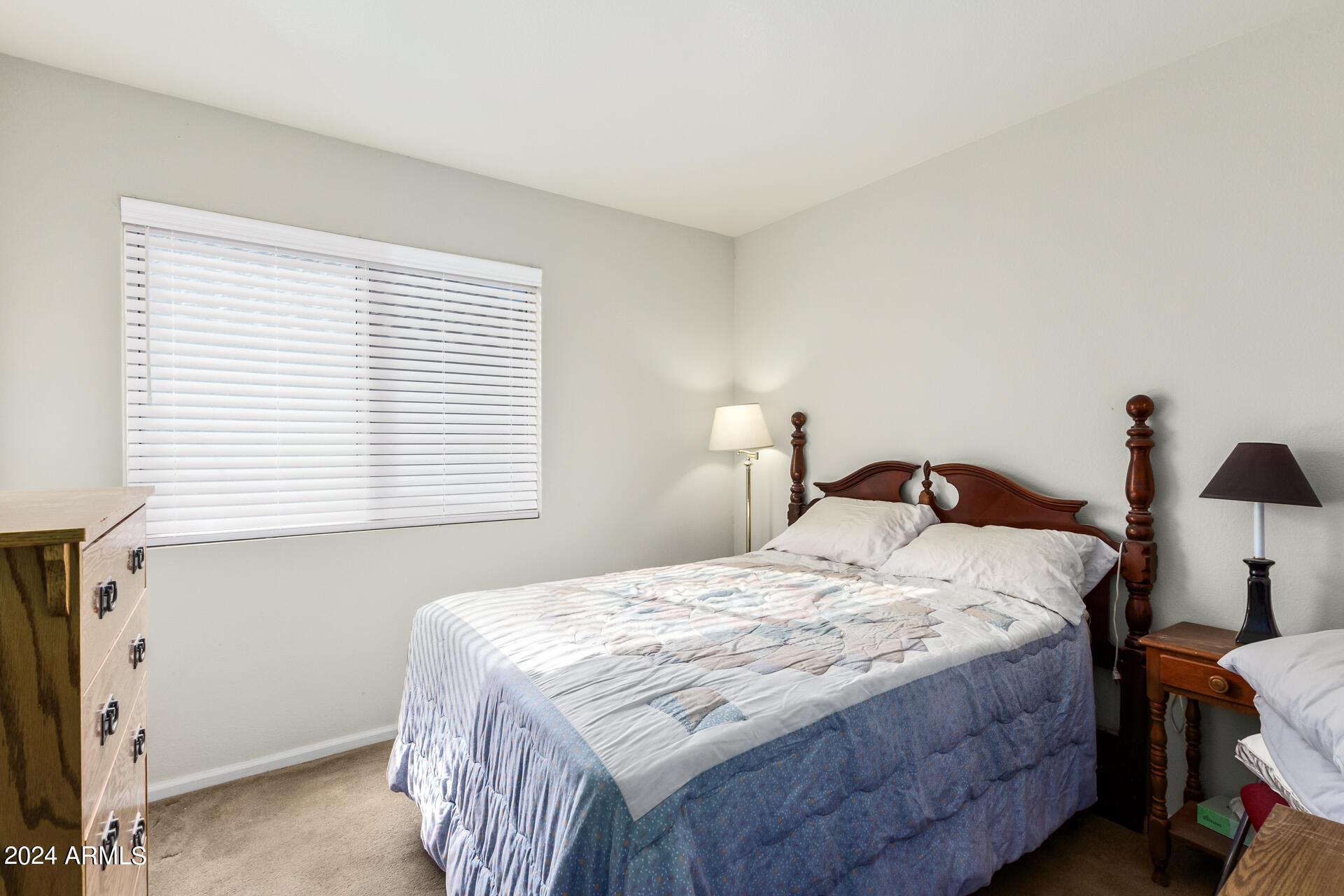 5131 Casper Road Mesa, AZ 85205 - Photo 24 of 32 a bedroom with a bed and a window