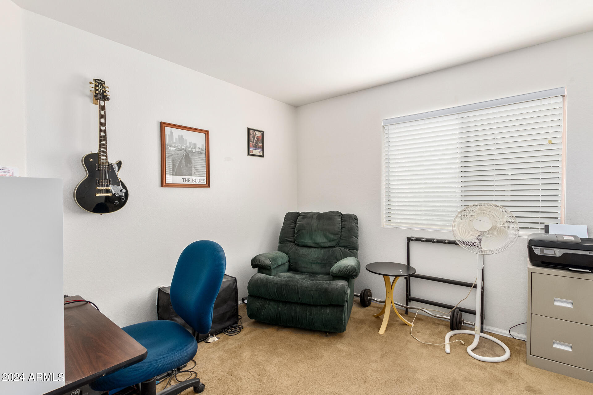 5131 Casper Road Mesa, AZ 85205 - Photo 27 of 32 a living room with furniture and a window