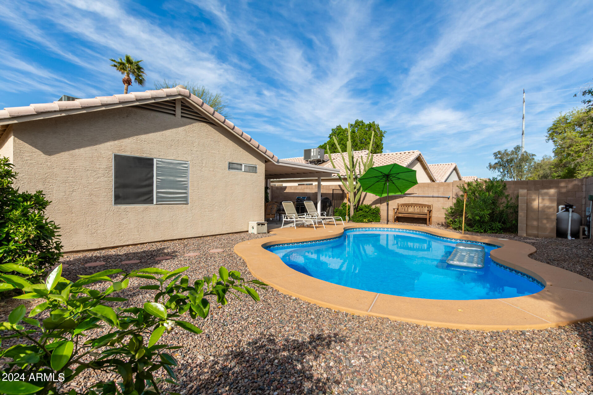 5131 Casper Road Mesa, AZ 85205 - Photo 3 of 32 a view of a house with swimming pool