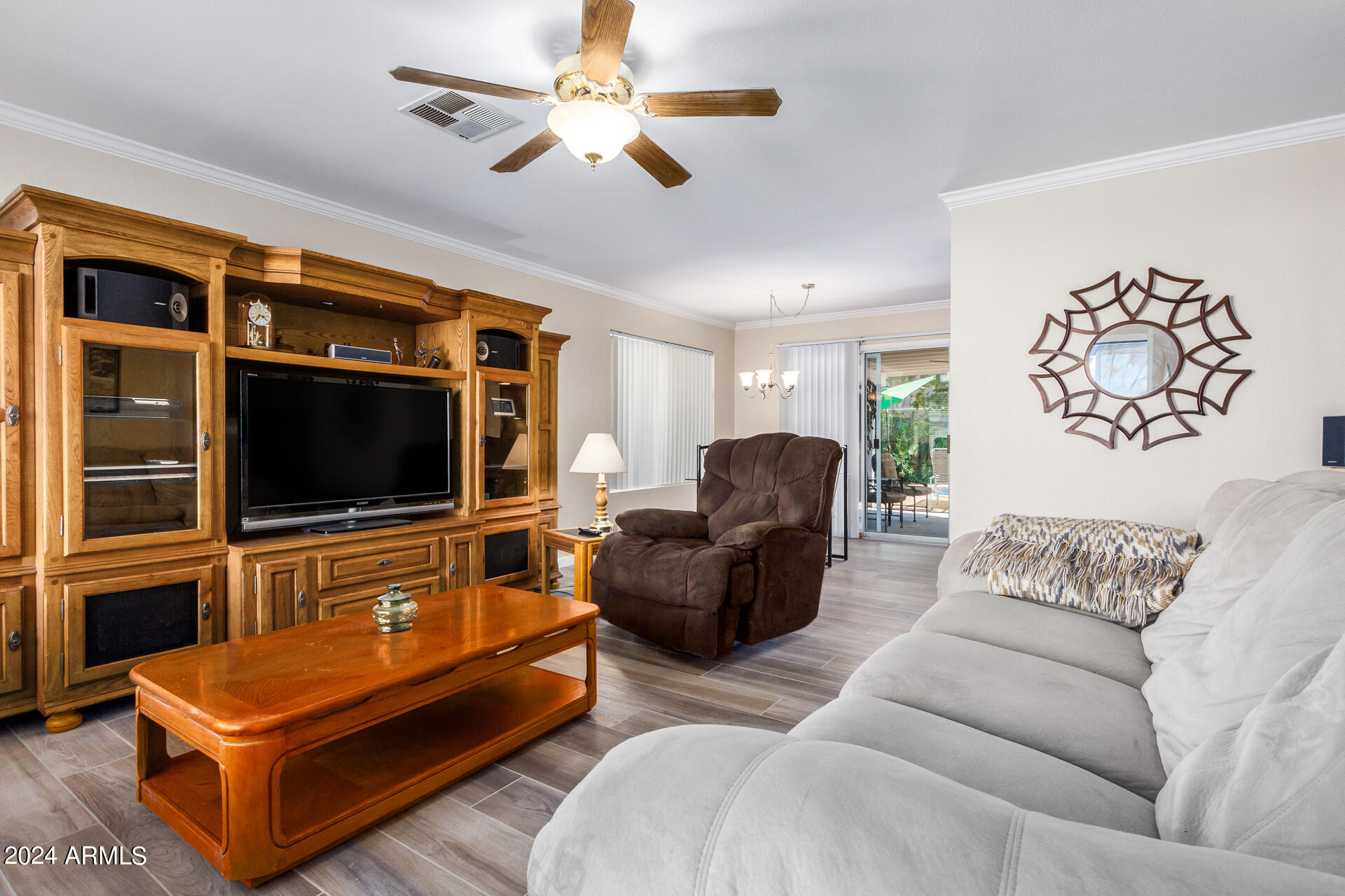 5131 Casper Road Mesa, AZ 85205 - Photo 8 of 32 a living room with furniture and a flat screen tv