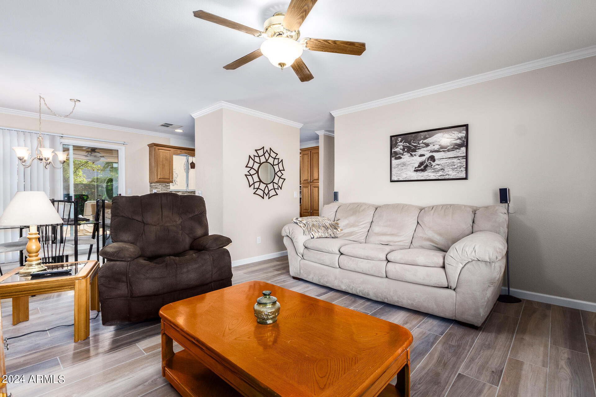 5131 Casper Road Mesa, AZ 85205 - Photo 9 of 32 a living room with furniture and a wooden floor