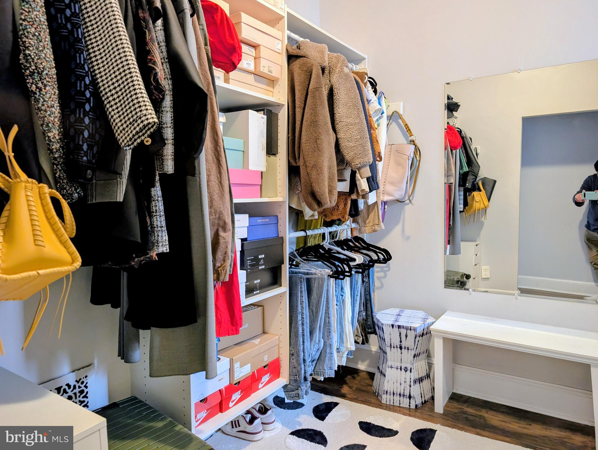 156 Mercer Street Princeton, NJ 08540 - Photo 17 of 24 a view of walk in closet with clothes and shoes