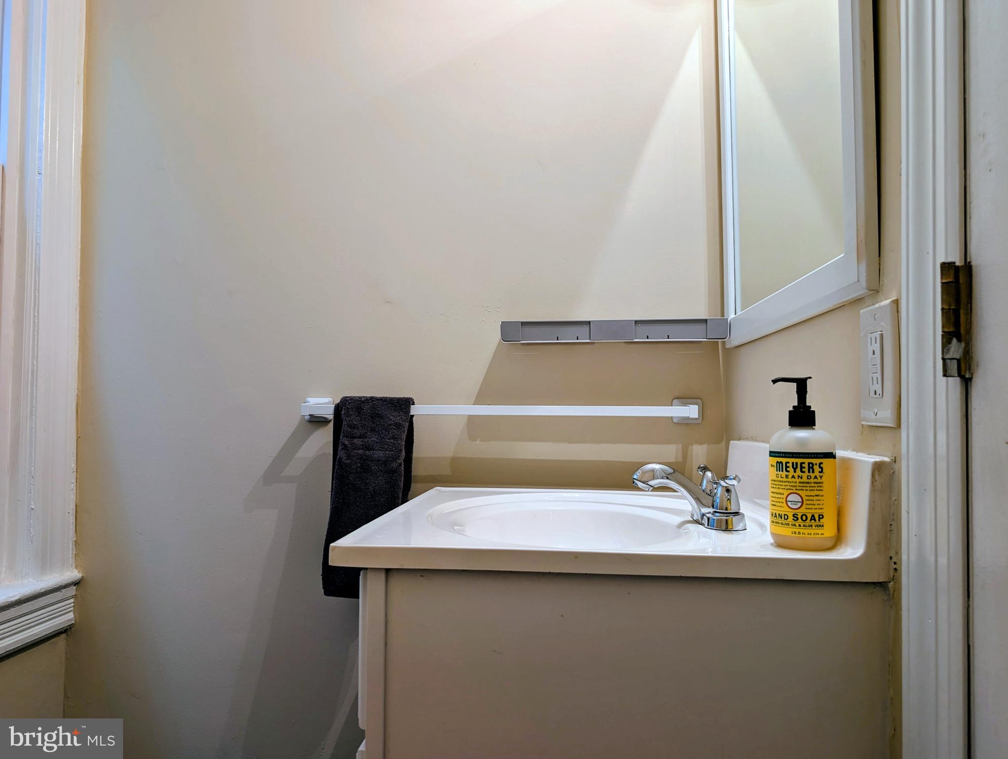 156 Mercer Street Princeton, NJ 08540 - Photo 9 of 24 a bathroom with a sink and a mirror