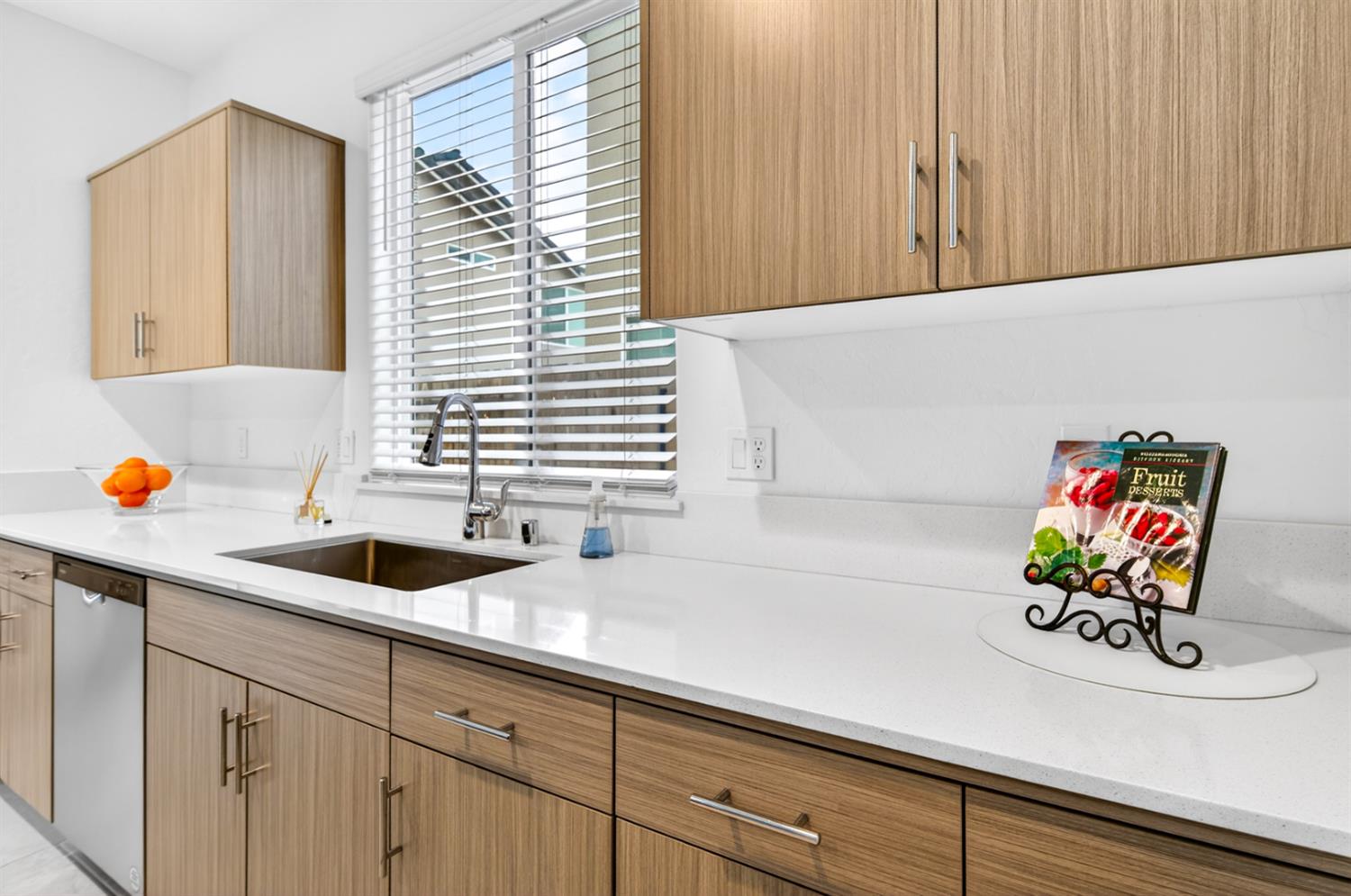 317 Talus Way South Madera, CA 93636 - Photo 19 of 61 a kitchen with a sink and a window