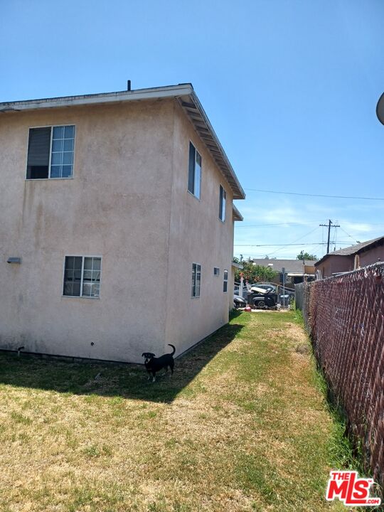 2223 East Oris Street Compton, CA 90222 - Photo 2 of 17 a view of a house with a backyard
