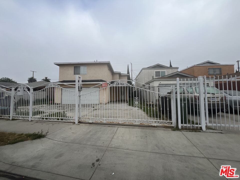 2223 East Oris Street Compton, CA 90222 - Photo 3 of 17 a view of a city from a terrace