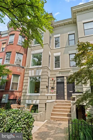 a view of a building with a street