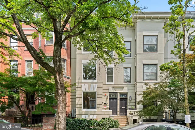 a view of a cafe with an outdoor seating