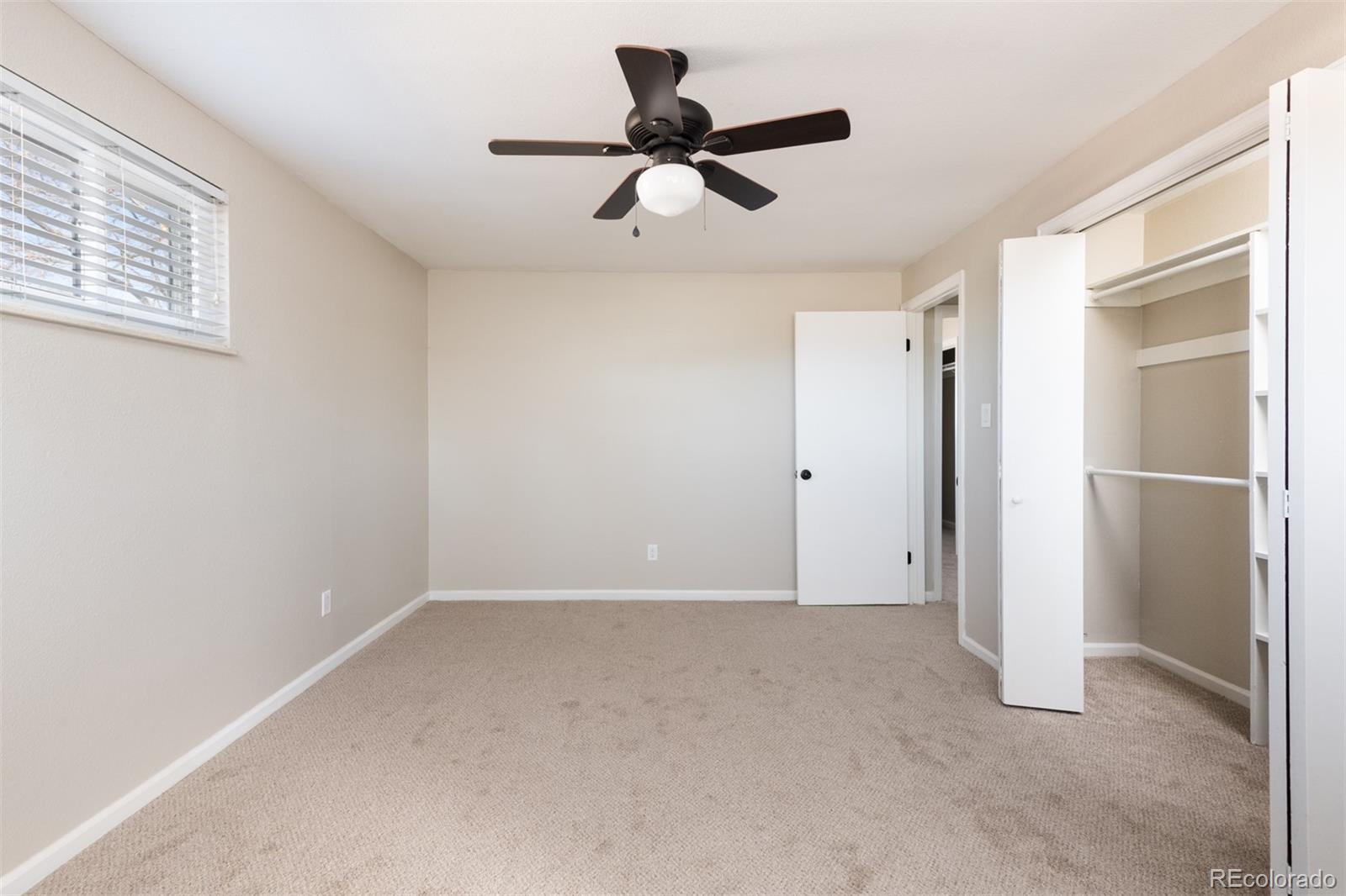 13766 Omega Circle Lone Tree, CO 80124 - Photo 25 of 37 a view of empty room with window