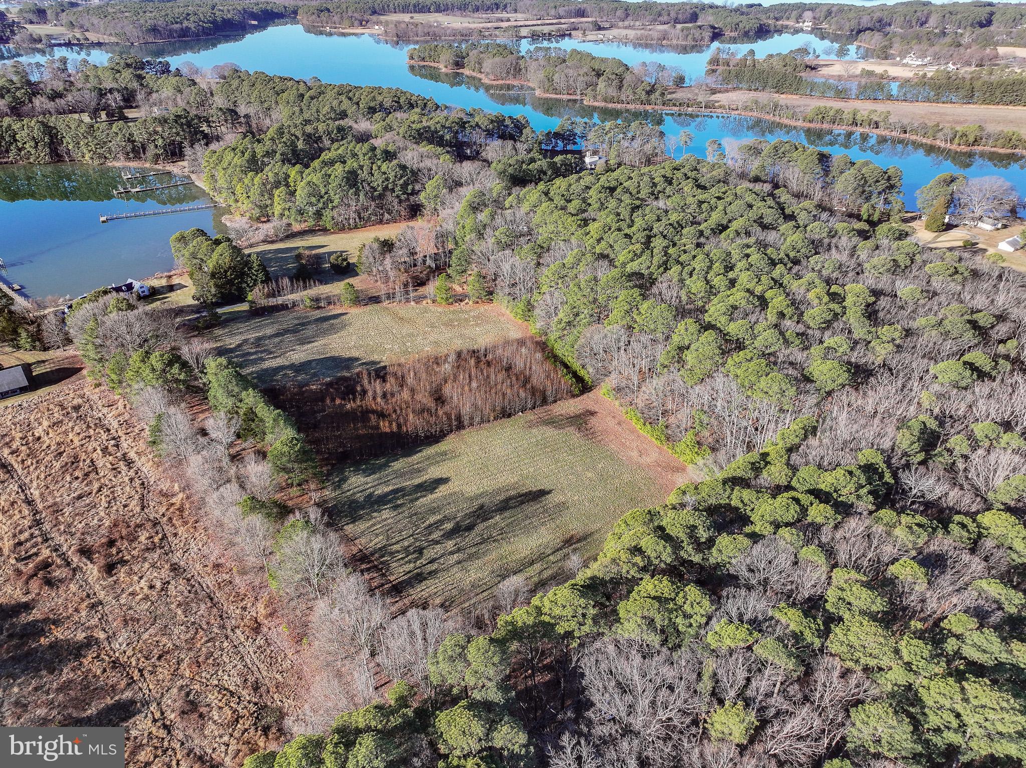 Cooper Point Road Bozman, MD 21612 - Photo 15 of 29 a view of a houses with a yard