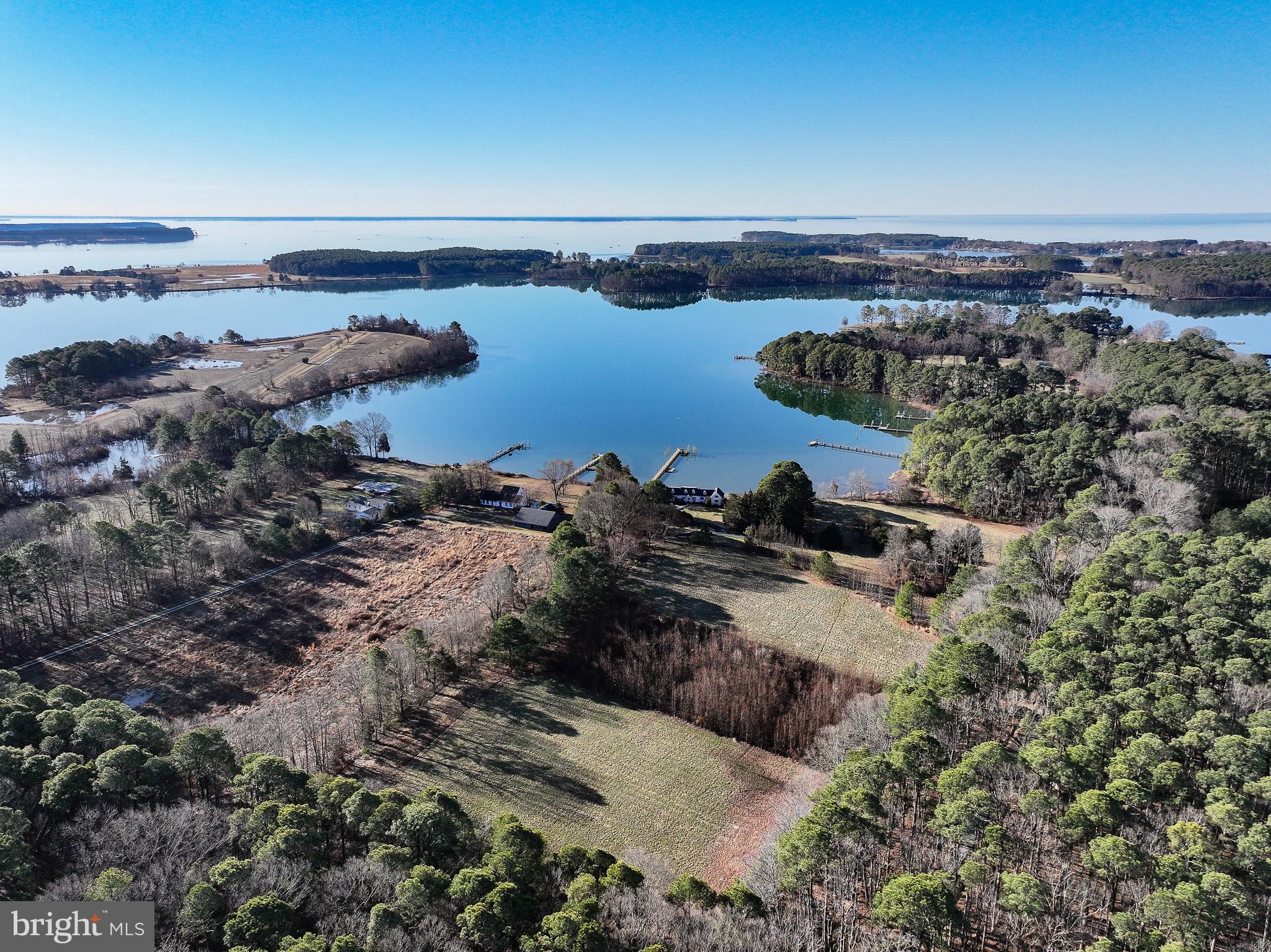 Cooper Point Road Bozman, MD 21612 - Photo 18 of 29 an aerial view of a houses with a lake