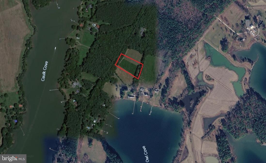 Cooper Point Road Bozman, MD 21612 - Photo 29 of 29 an aerial view of waterside residential house with outdoor space