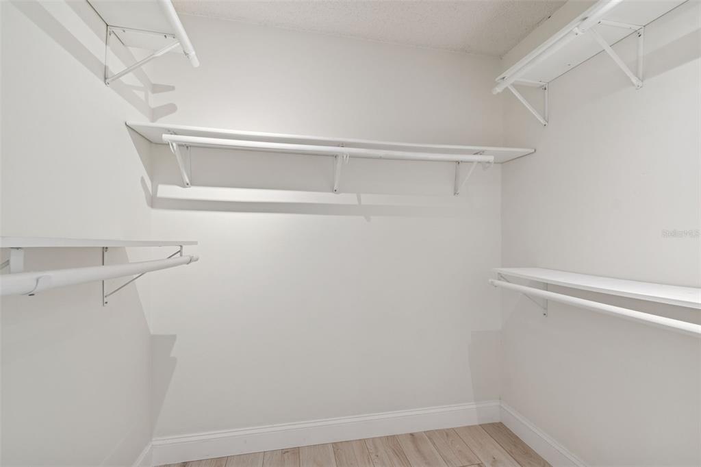 7337 Cambridge Way Clearwater, FL 33764 - Photo 14 of 28 a view of small space with racks on the wall