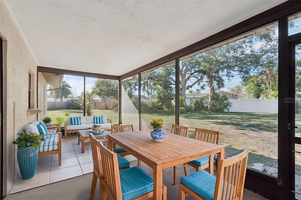 7337 Cambridge Way Clearwater, FL 33764 - Photo 24 of 28 a view of a dining room with furniture window and outside view