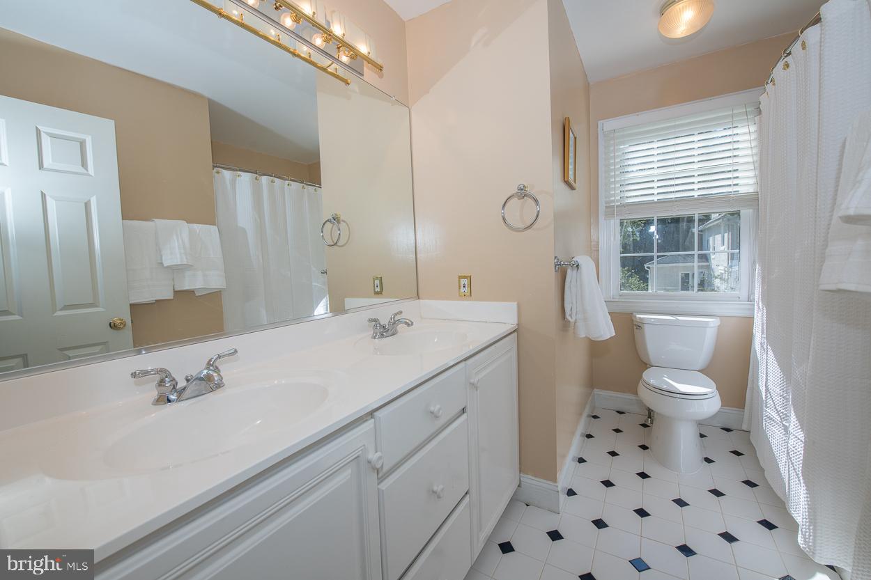 312 Conestoga Road Devon, PA 19333 - Photo 22 of 29 a bathroom with a sink a toilet and shower