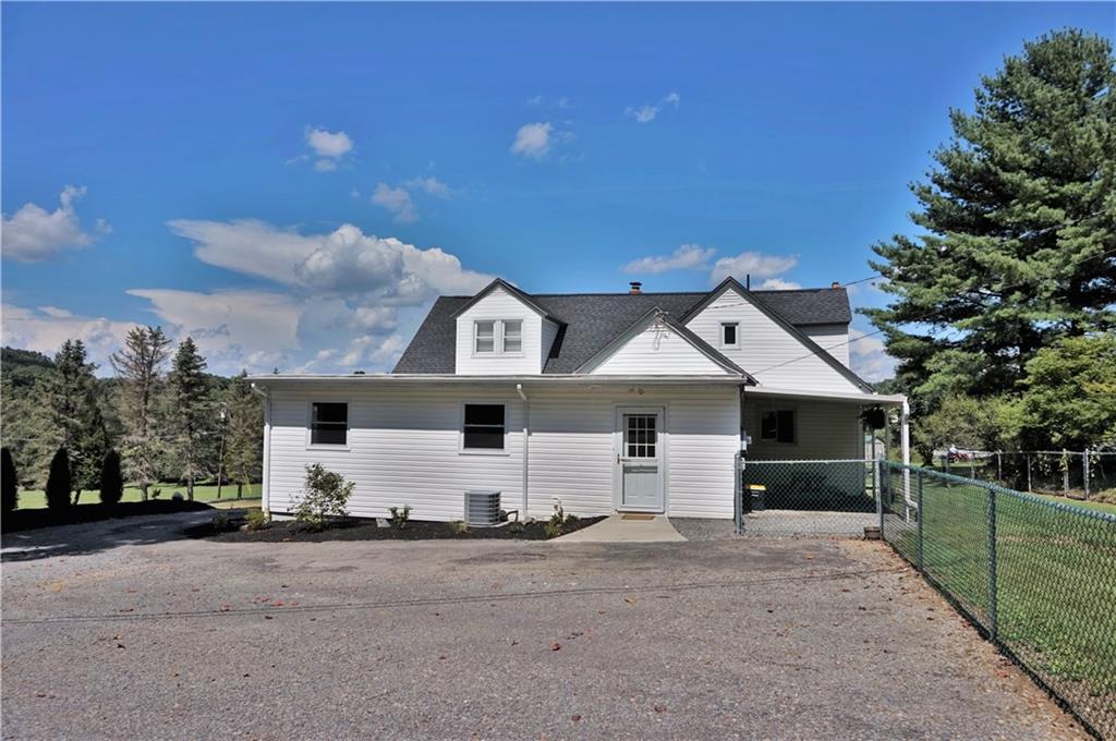 221 Kilgallen Road Butler, PA 16002 - Photo 3 of 25 Lots of parking space, covered side patio area, and rear entry with no steps!