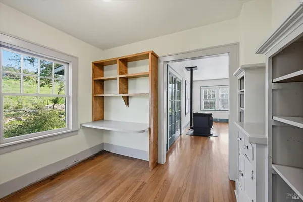 a view of livingroom with furniture and wooden floor