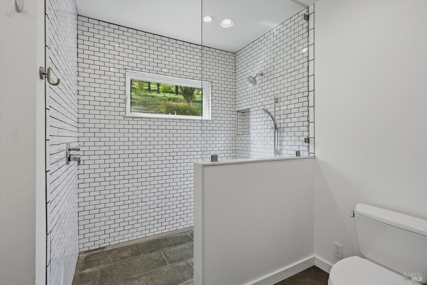 1830 Howell Mountain Road St. Helena, CA 94574 - Photo 18 of 33 a bathroom with a toilet and a shower