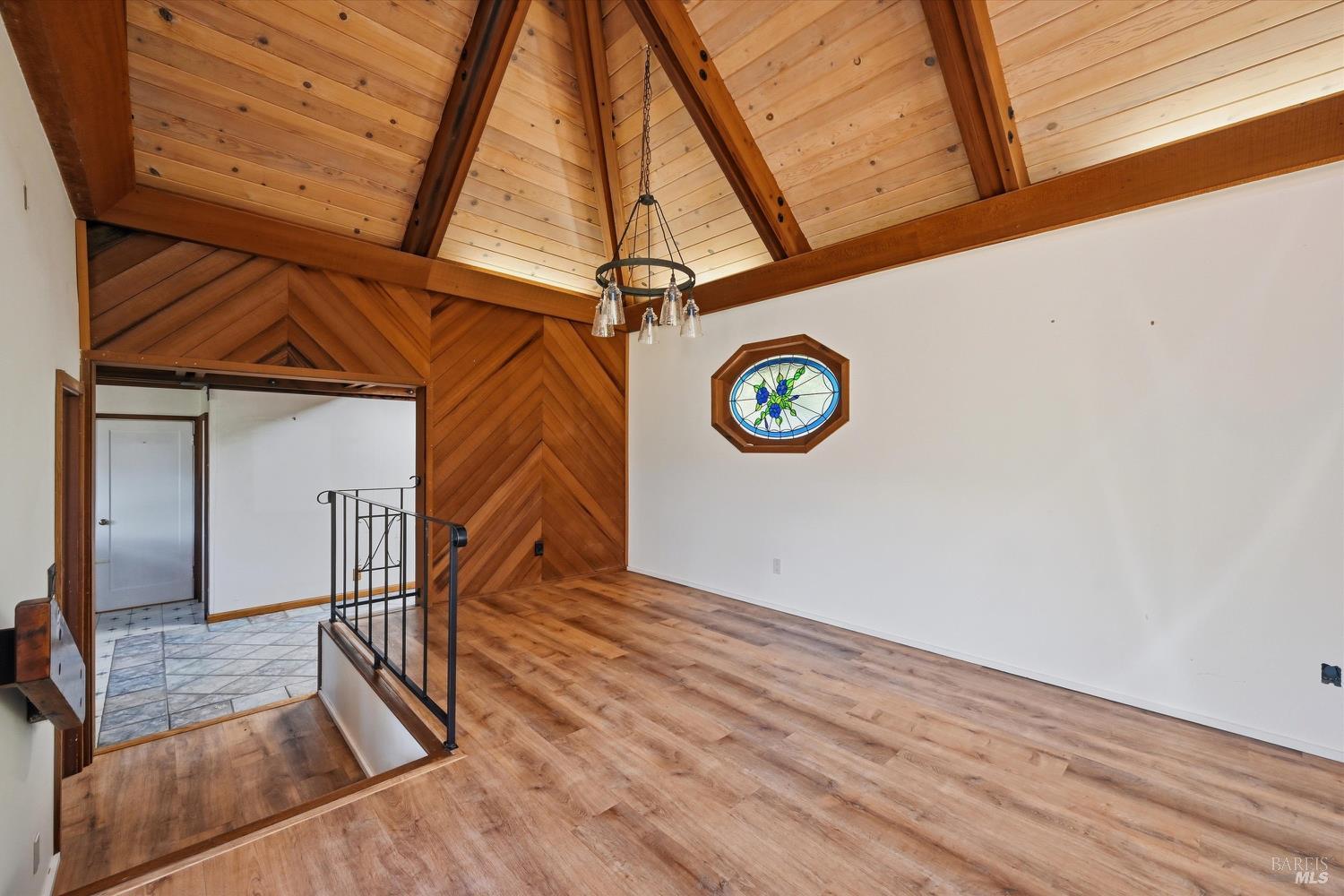 1830 Howell Mountain Road St. Helena, CA 94574 - Photo 7 of 33 a view of a room with wooden floor and white walls