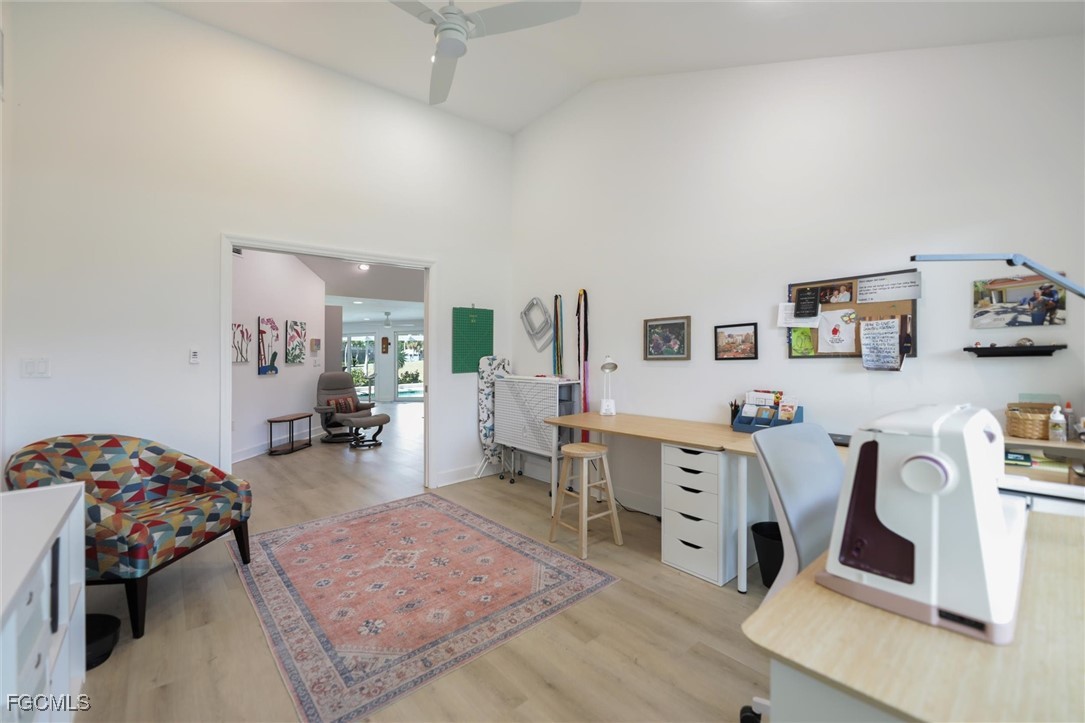 1264 Par View Drive Sanibel, FL 33957 - Photo 16 of 50 a bedroom with furniture and a wooden floor