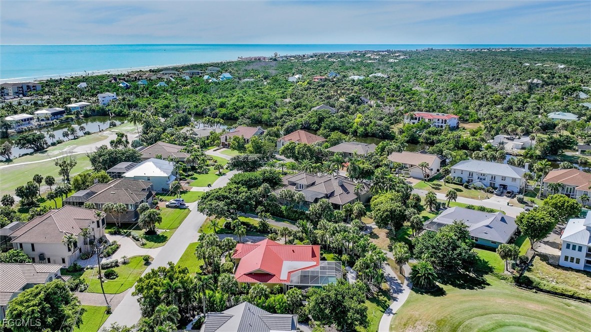 1264 Par View Drive Sanibel, FL 33957 - Photo 22 of 50 an aerial view of residential houses with outdoor space and trees all around