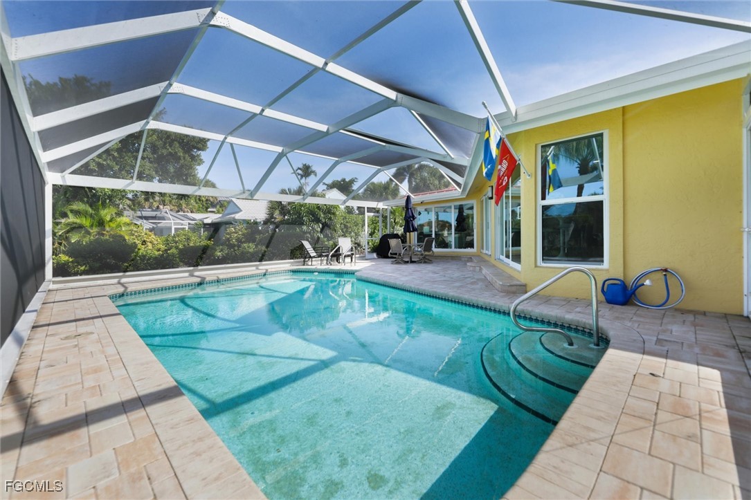 1264 Par View Drive Sanibel, FL 33957 - Photo 36 of 50 a view of swimming pool with a patio
