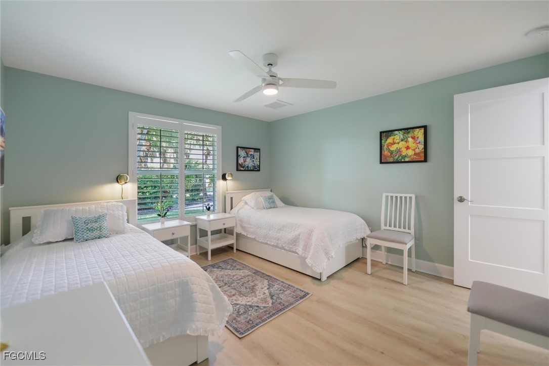 1264 Par View Drive Sanibel, FL 33957 - Photo 46 of 50 a bedroom with two beds and a window