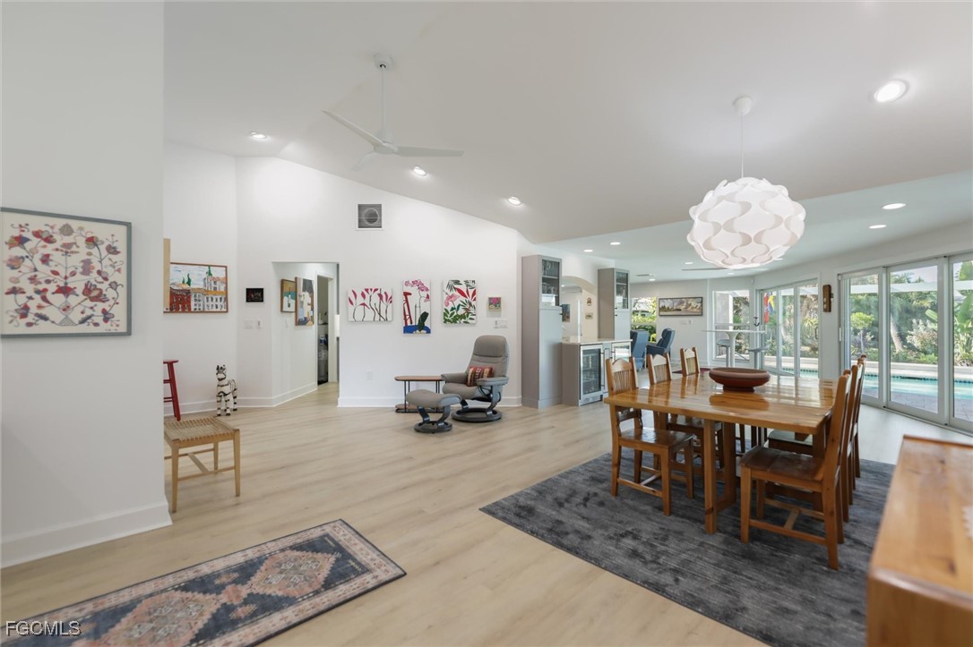 1264 Par View Drive Sanibel, FL 33957 - Photo 49 of 50 a view of a dining room with furniture window and wooden floor