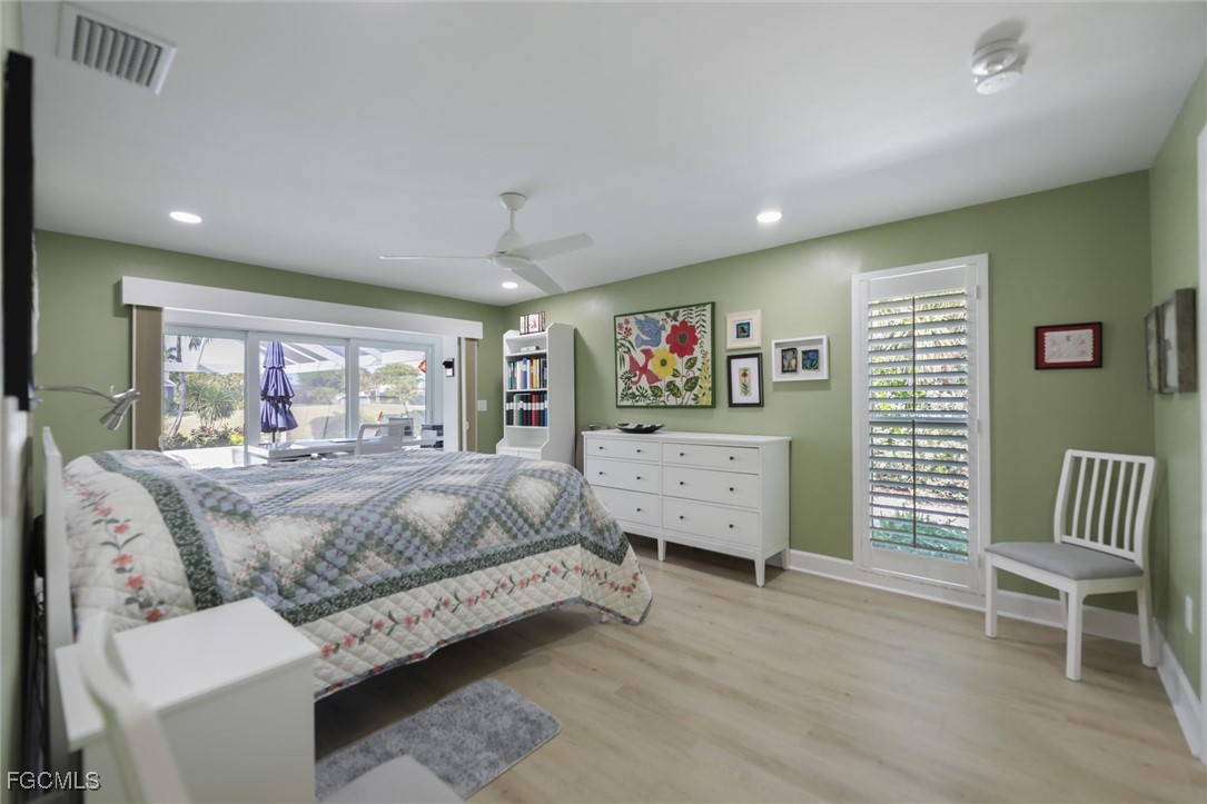 1264 Par View Drive Sanibel, FL 33957 - Photo 8 of 50 a spacious bedroom with a bed and a large window