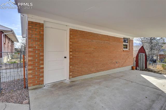 534 Yellowstone Road Colorado Springs, CO 80910 - Photo 39 of 40 Covered Storage area off the garage.